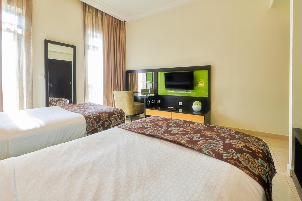 Bahi Ajman Palace Hotel Luaran gambar A room at the hotel