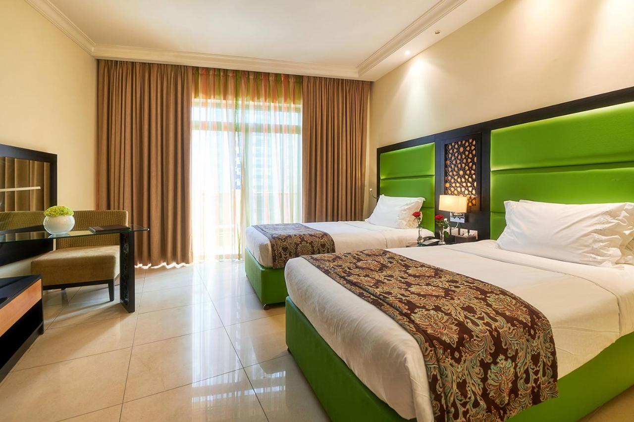 Bahi Ajman Palace Hotel Luaran gambar Deluxe Room